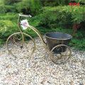 STALAK ZA CVIJEĆE TRICIKL METALNI ANTIK ZLATNO-CRNI 47x18x33 CM
