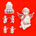 ANĐEO FIGURA SJEDEĆI BIJELI S GLITER KRILIMA 4,5 cm