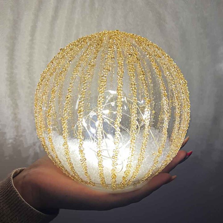 KUGLA S LED SVJETLIMA NA BATERIJE - ZLATNE GLITER LINIJE 15 cm