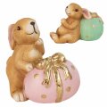 ZEC FIGURA KOJI STOJI/SJEDI KRAJ JAJA 11,5 CM