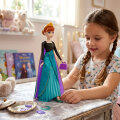 DISNEY PRINCEZA LUTKA 30 cm FROZEN ANNA S IZNENAĐENJEM - MATTEL